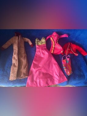 Lot of vintage Barbie doll clothing!